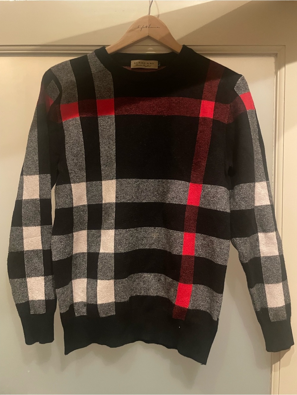 Navy Plaid women’s sweater with red and grey Accents